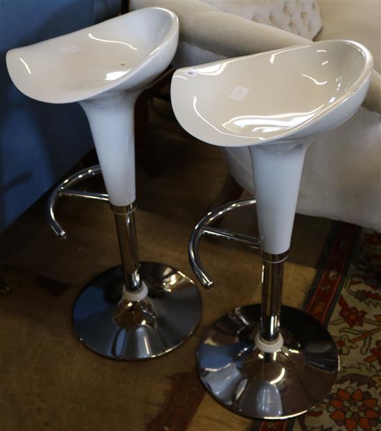 2 white bar stools